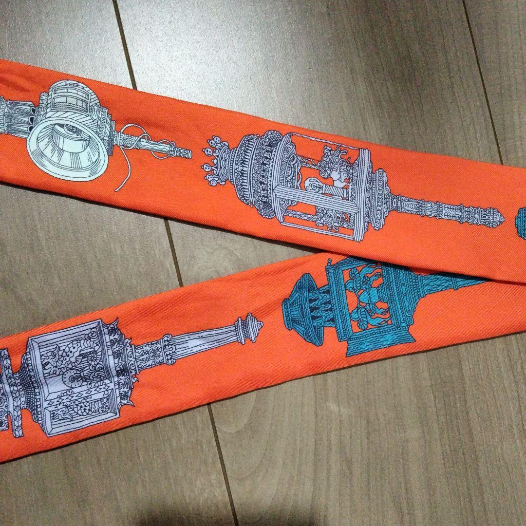 ま HERMES ツイリー オレンジ シルク スカーフ
